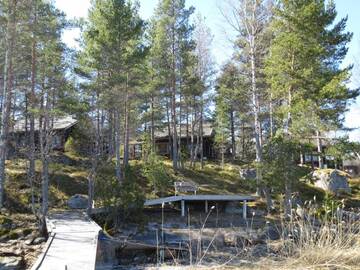 Фото номера Коттедж с 3 спальнями и сауной Дома для отпуска Rönnäs Seaside Resort г. Isnäs 22